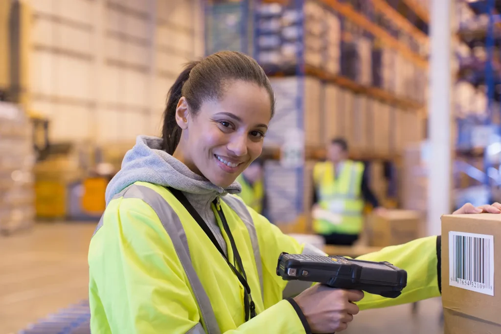 Light industrial worker holding a scanner